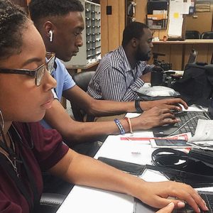 SHARON JOY WASHINGTON, Elae Hill and Tedarius Abrams work on stories at the Chicago Crusader office. The three HBCU interns are participating in Chevrolet’s Discover The Unexpected summer program with several Black newspapers. (Photo by Erick Johnson).