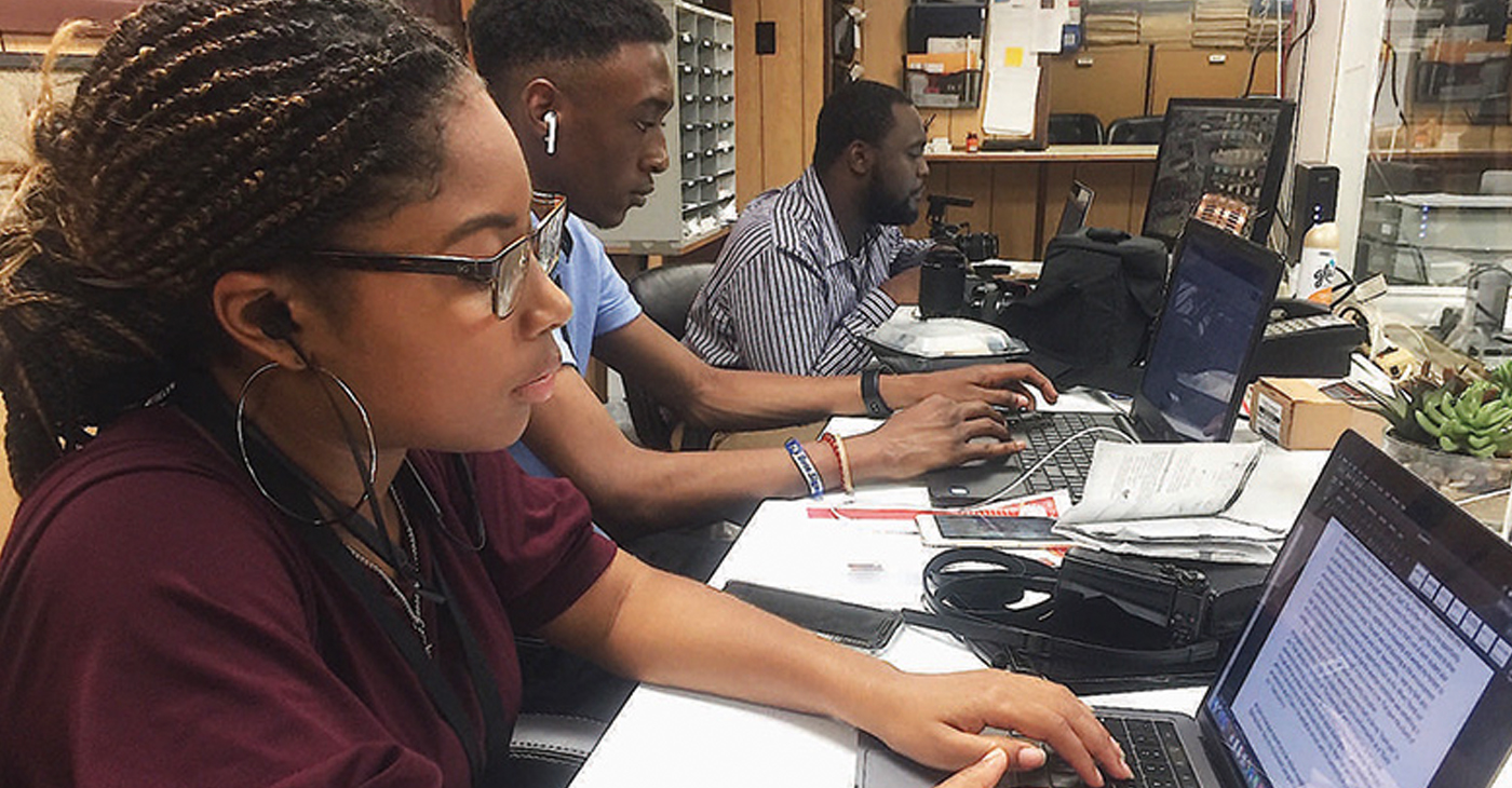 interns-start-at-the-crusader-featured-web SHARON JOY WASHINGTON, Elae Hill and Tedarius Abrams work on stories at the Chicago Crusader office. The three HBCU interns are participating in Chevrolet’s Discover The Unexpected summer program with several Black newspapers. (Photo by Erick Johnson).